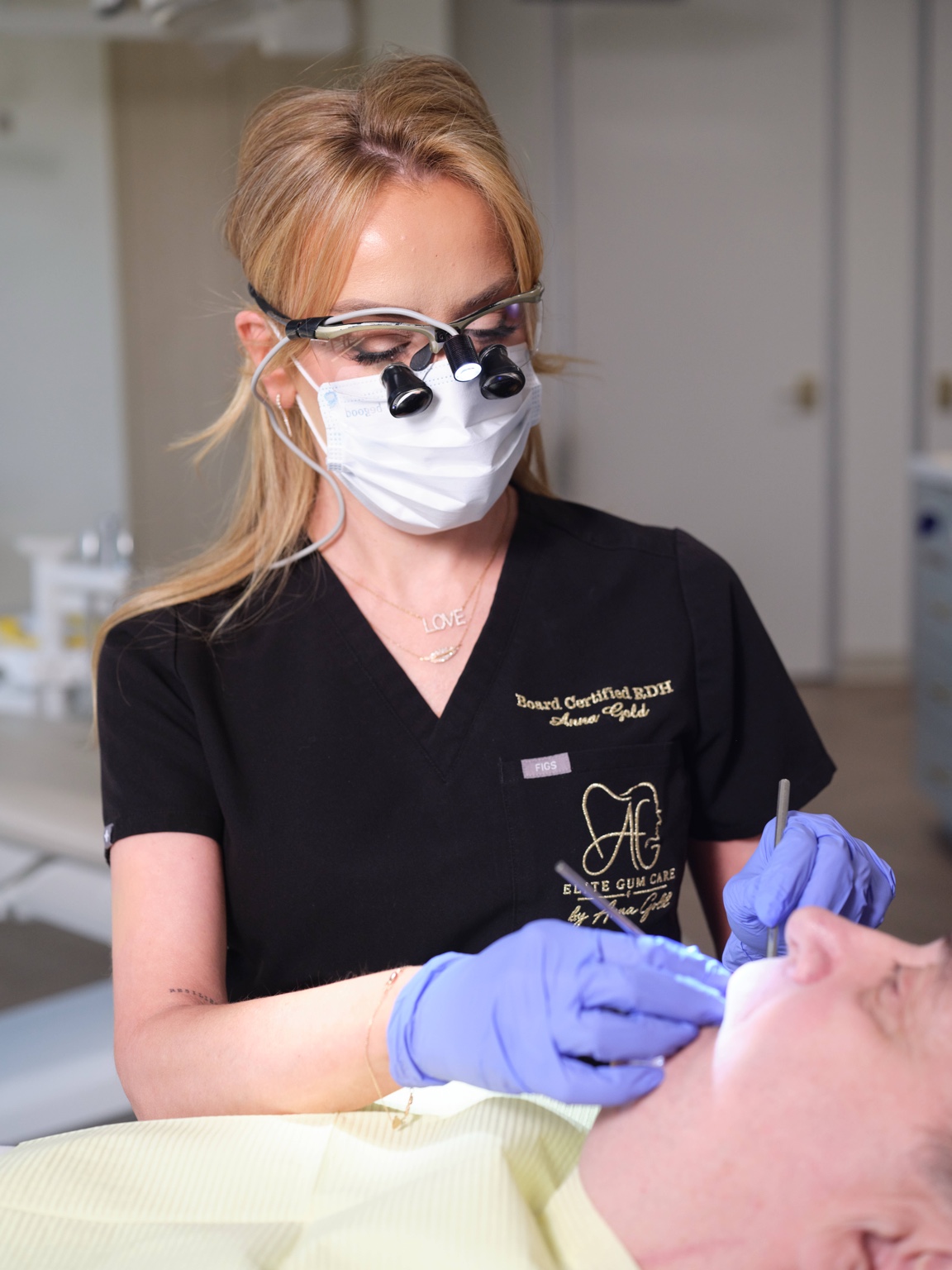 Anna Gold providing personalized dental hygiene care to a patient